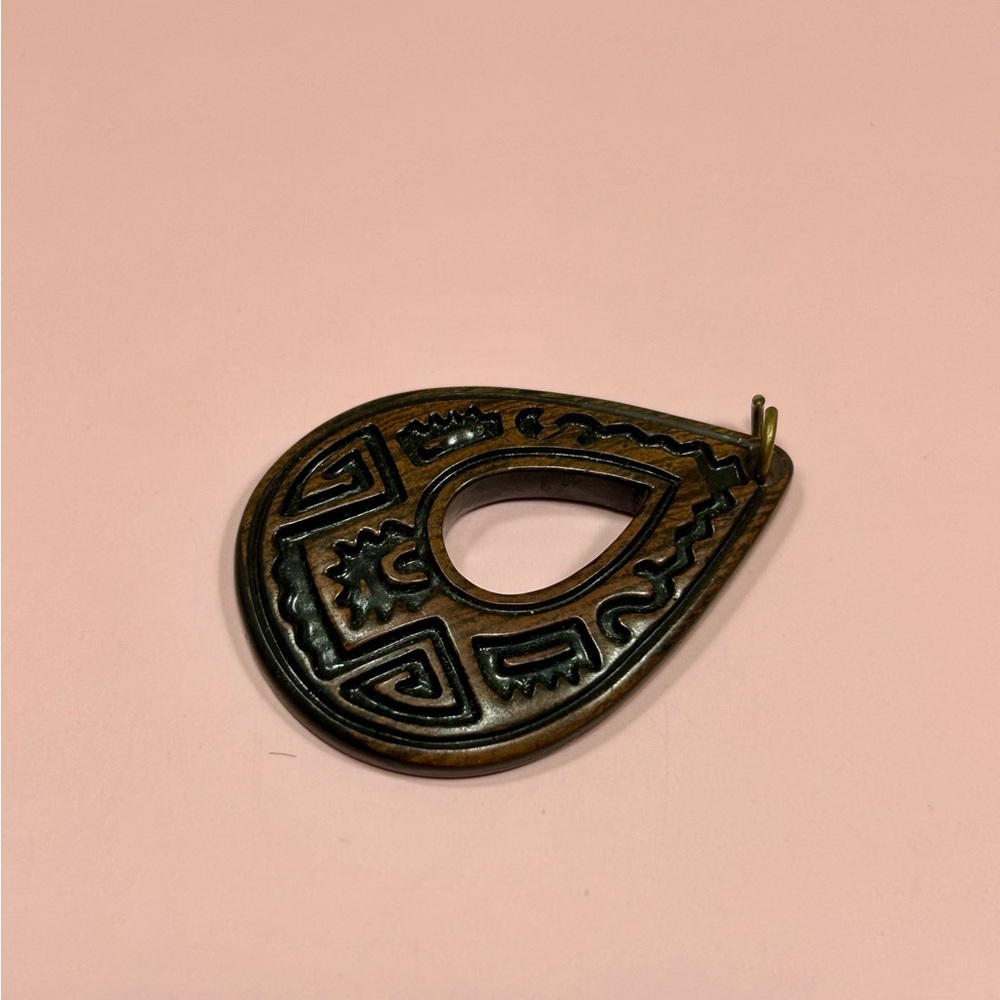 Teardrop Shaped Pendant with Intricate Design